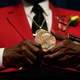 Tuskegee Airman Major Anderson shows off a Congressional Gold Medal given to all Tuskegee Airmen during a ceremony commemorating Veterans Day and honoring the group of World War II airmen Nov. 11, 2013, in Washington, D.C.